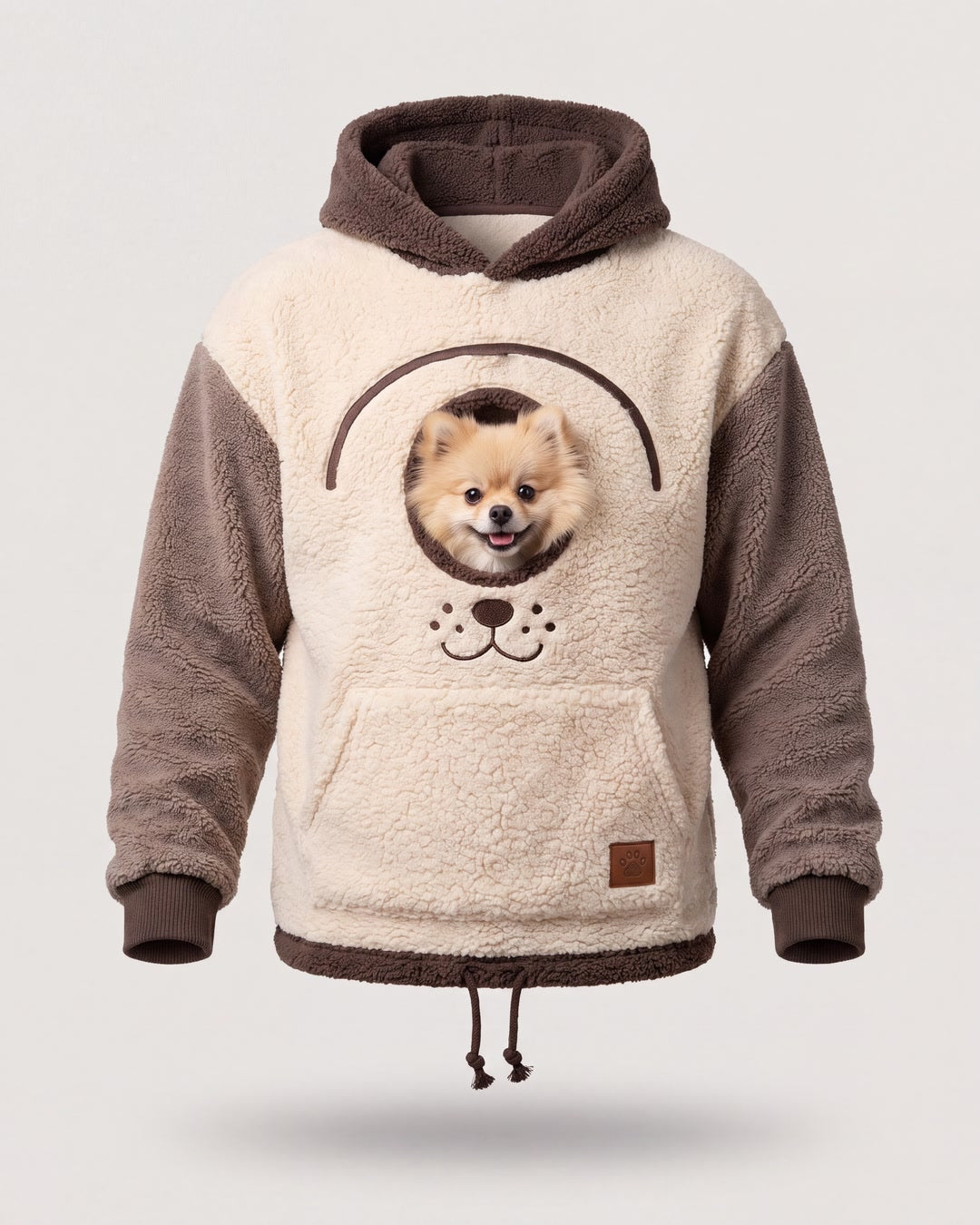 Sudadera KangaPaw con un pomerania asomando del bolsillo